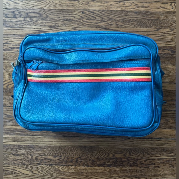 Amelia Erhart Stripes Vintage Ventura duffel bag Luggage Color is Cosmetic Blue